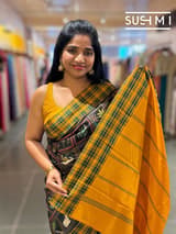 Black printed soft silk saree with burberry checks border : D62F033