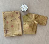 Gold tissue saree in half and half style