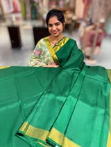 Emerald Green vintage Kanchipuram silk saree with 2inch borders paired with pen kalamkari blouse SS50178