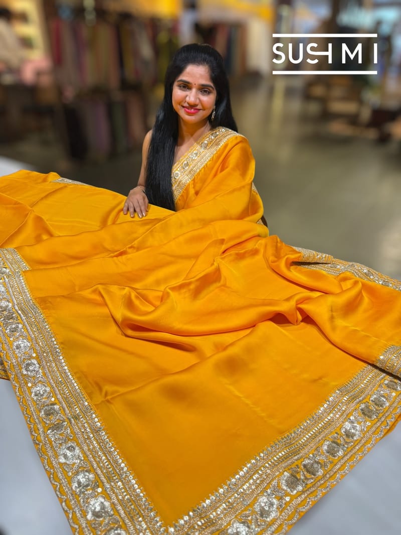 Marigold yellowish Orange Satin Saree with sabyasachi borders : D62F046