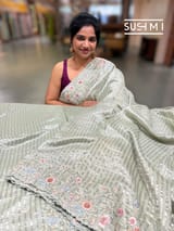 Mint mul tissue Saree with handcrafted floral border