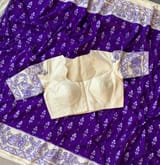 Violet ikkath patola saree with madhubani handpainting