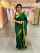 Emerald Green vintage Kanchipuram silk saree with 2inch borders paired with pen kalamkari blouse SS50178