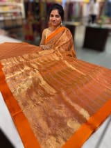 Orange Tissue saree with kanchi silk embroidered blouse