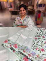Mint kora tissue saree with pythani inspired embroidery