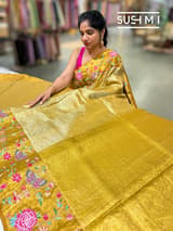 Gold Kanjeevaram Tissue Sareewith petite point embroidery : D62F085