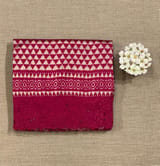 Ruby pink Cambodian–inspired Ikkat Silk Saree with cutwork Rose Border