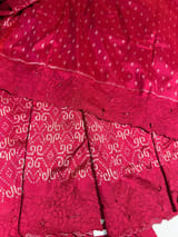 Reddish Pink Cambodian–inspired Ikkat Silk Saree with cutwork Rose Border