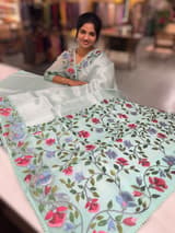 Mint kora tissue saree with pythani inspired embroidery