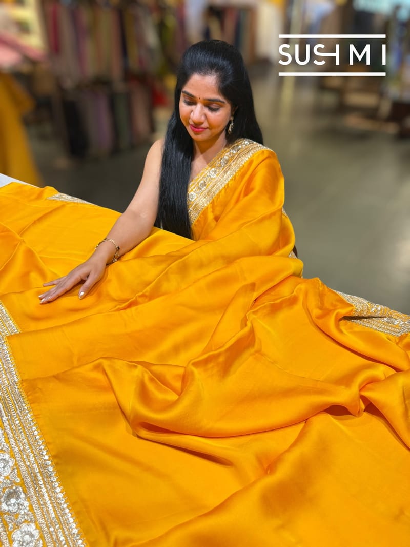 Marigold yellowish Orange Satin Saree with sabyasachi borders : D62F046