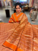 Orange Tissue saree with kanchi silk embroidered blouse