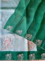 Bottle Green Premium Handloom Designer Tissue saree with exquisite embroidery