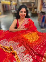 Orangish Red Designer Rai Bandhej Saree With Embroidered Border SS50484