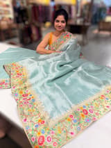 Dusty Blue Tissue Stripes Saree with petite point Embroidered tissue border and blouse .