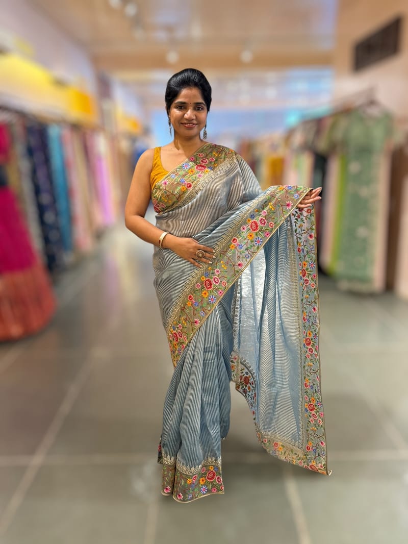 Blue Tissue Stripes Saree with petite point Embroidered tissue border and blouse . SS50424