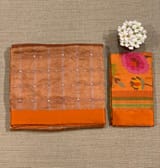 Orange Tissue saree with kanchi silk embroidered blouse