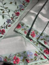 Mint kora tissue saree with pythani inspired embroidery