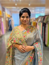 Blue Tissue Stripes Saree with petite point Embroidered tissue border and blouse . SS50424
