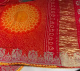Orangish Red Designer Rai Bandhej Saree With Embroidered Border SS50484
