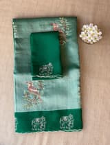 Bottle Green Premium Handloom Designer Tissue saree with exquisite embroidery