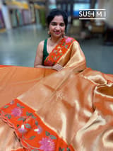 Orange Banarasi Tissue with pythani inspired embroidery