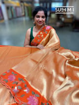 Orange Banarasi Tissue with pythani inspired embroidery