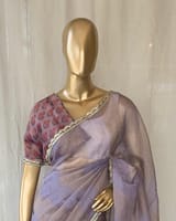 Mauve tissue saree in half and half style with floral and birds