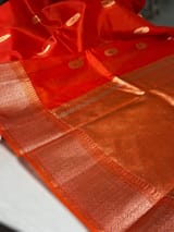 Dark Orange Premium Kora Banarasi Saree with heavy weaving borders and Raw mango style motifs