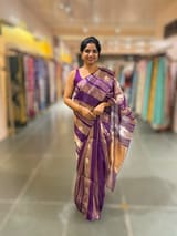 Purple Banarasi Handloom Kora Tissue Stripes with allover kaduwa woven lotus  motifs .