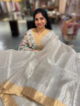 Silver tissue checks Saree with pythani inspired embroidered tissue blouse