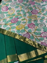 Emerald Green vintage Kanchipuram silk saree with 2inch borders paired with pen kalamkari blouse SS50178