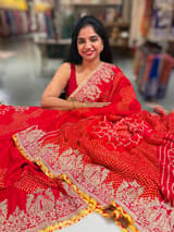 Orangish Red Designer Rai Bandhej Saree With Embroidered Border SS50483
