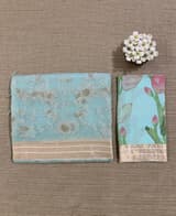 Baby Blue Muslin allover embroidered Saree with pichwai printed blosue