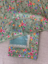 Dusty Blue Tissue Stripes Saree with petite point Embroidered tissue border and blouse .