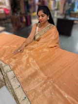 Peach Tissue Saree with pythani tissue embroidered border SS50543