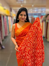 Orange Dhupion Raw Silk Saree with Gharchola bandhini blouse SS55490