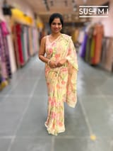 Pastel yellow printed georgette saree with handwork : S62F195
