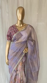 Mauve tissue saree in half and half style with floral and birds
