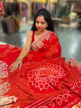 Orangish Red Designer Rai Bandhej Saree With Embroidered Border SS50483