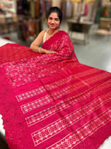 Reddish Pink Cambodian–inspired Ikkat Silk Saree with cutwork Rose Border