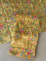 Mango yellow Tissue Stripes Saree with petite point Embroidered tissue border and blouse .
