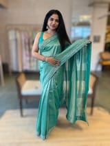 Teal Tissue Gorgette saree with sabyasachi borders and allover pitawork blouse SS50443