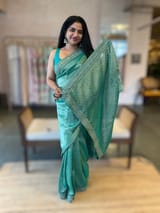 Teal Tissue Gorgette saree with sabyasachi borders and allover pitawork blouse SS50443