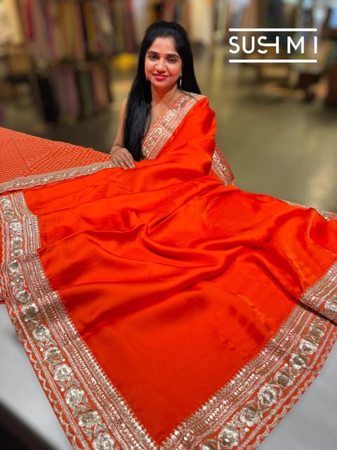 Fanta Orange Satin Saree with Statement Borders