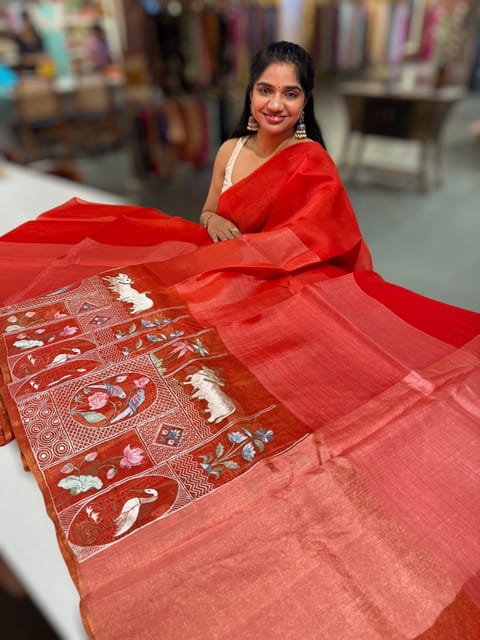 Reddish Orange Kora-Tussar Blend Handloom Saree with Tissue Embroidered Skirt Border