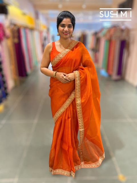 Rust Orange Organza Saree with Statement Borders