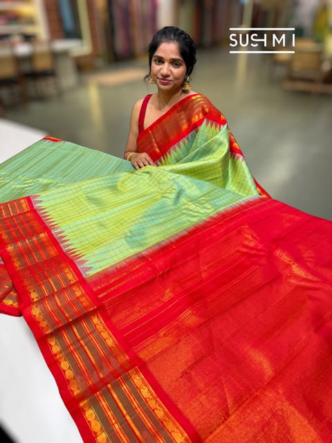 Mint Green Gadwal Silk Saree with Temple Border