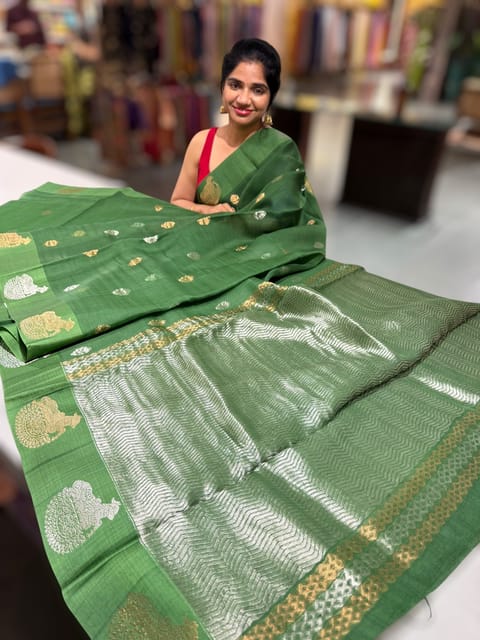 Emerald Green Kora Muslin Saree with Kaduwa Woven Nandi Motif Border