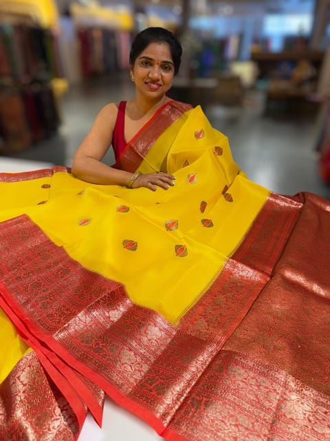 Sunflower Yellow and Orangish Red Kora Banarasi Saree with Meenakari Kaduwa Woven Motifs