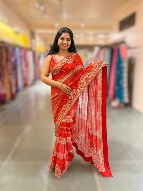 Orangish Red Georgette Saree with Allover Mirror Work